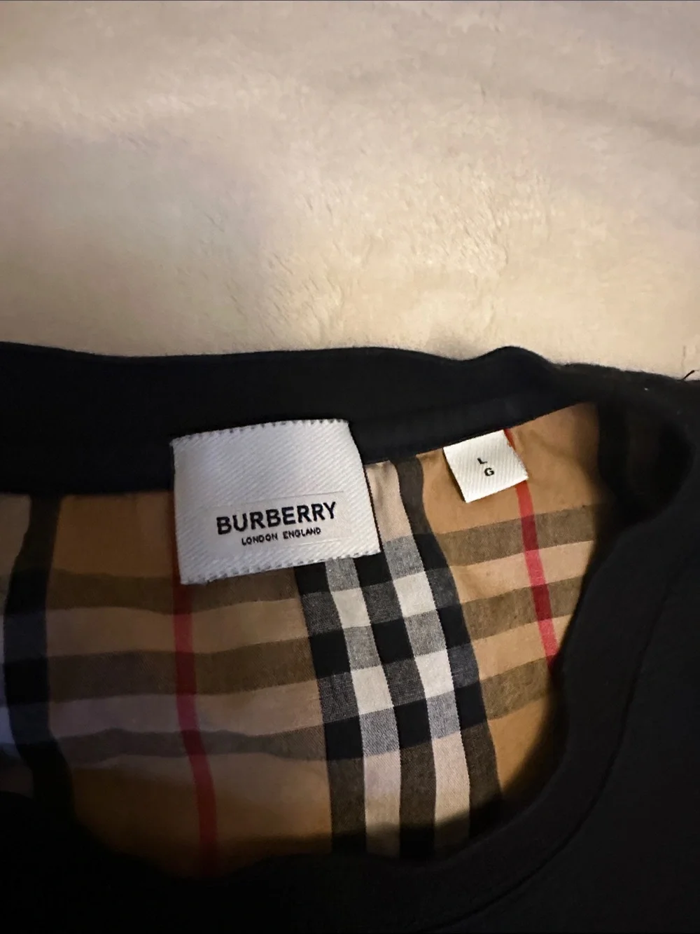Burberry Black Tee with Tan Plaid Sleeves